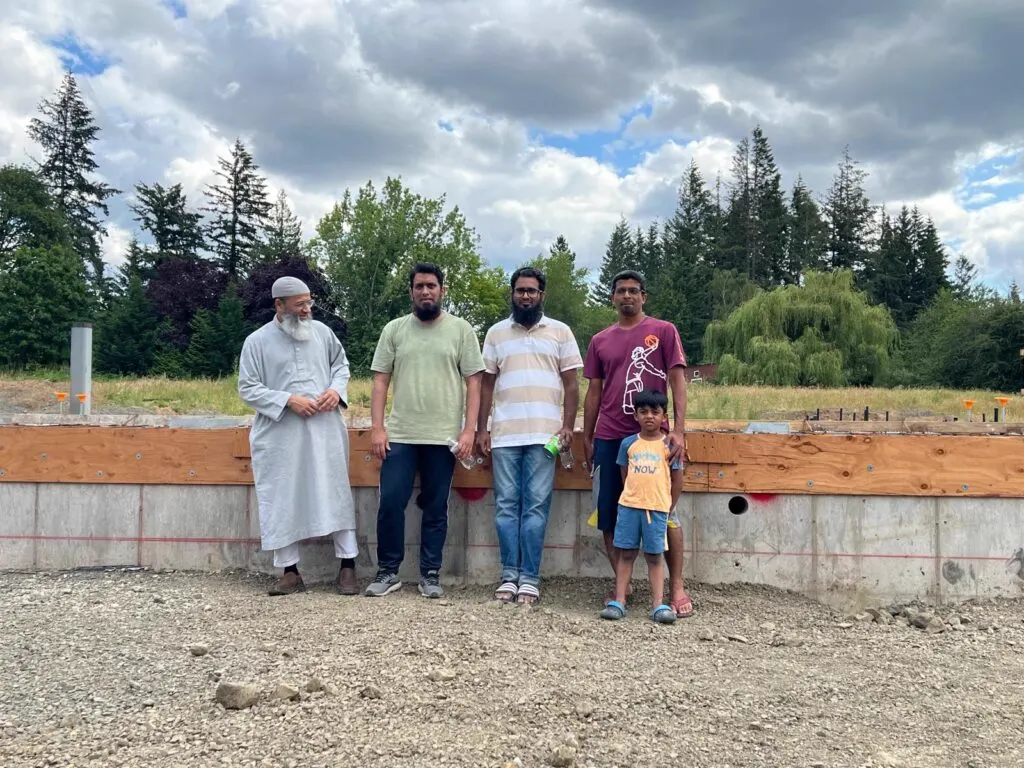 Community members visiting the new masjid foundation in June 2024